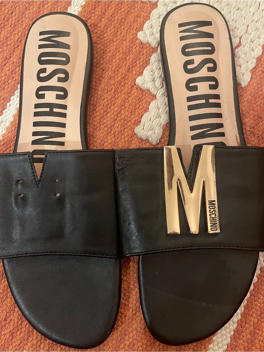 Moschino Black Leather Slides with Gold 'M' Accent